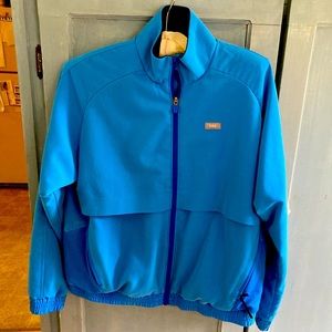 Figs women’s Capri Blue Sydney jacket.